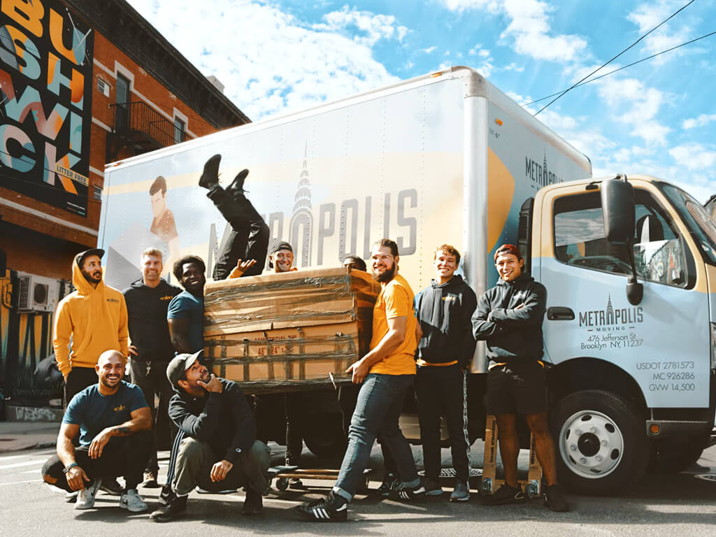 image of some guy removing box from truck