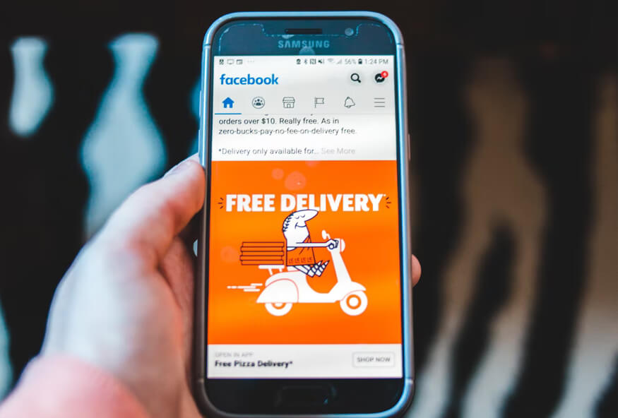 showing a cell phone with the delivery screen